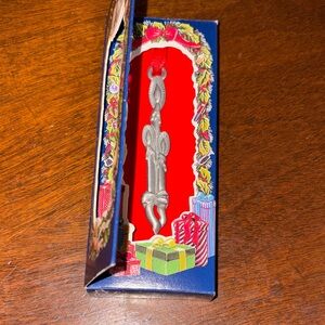 Three candles pewter Ornament with Red Ribbon